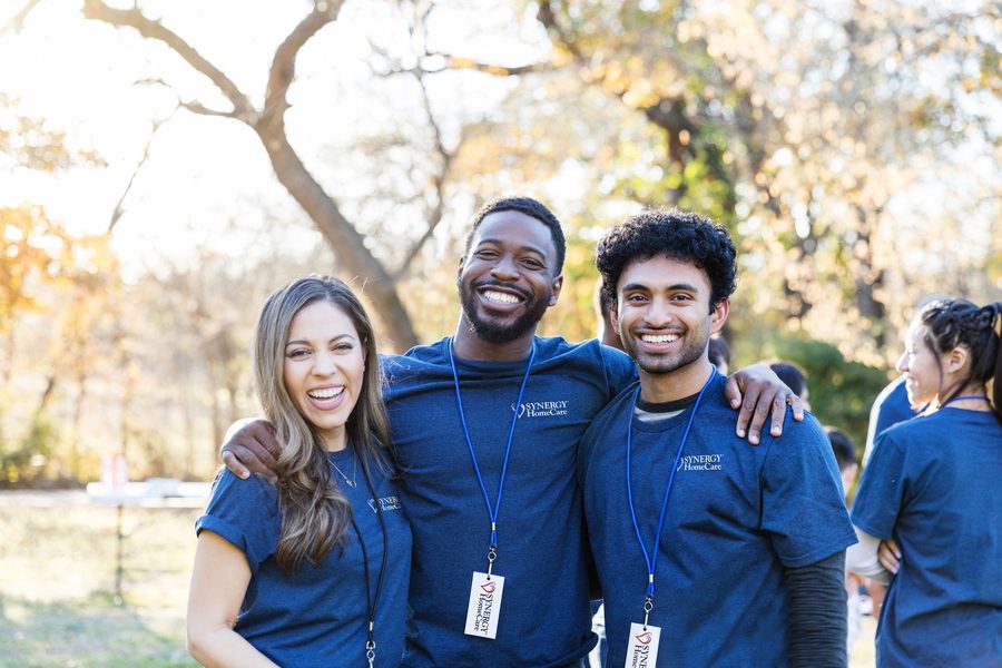 SYNERGY HomeCare caregivers together outdoors